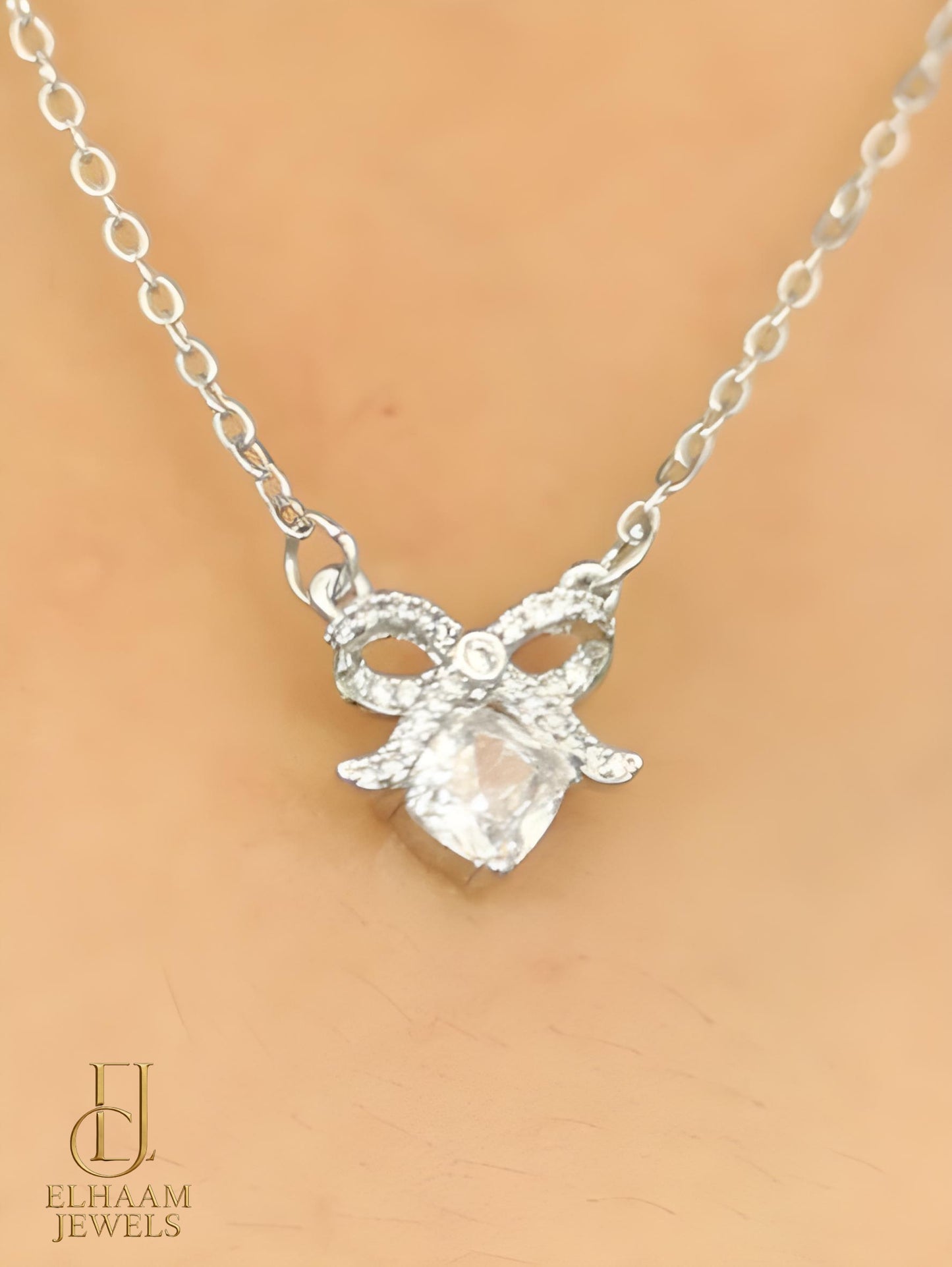 Silver Bowknot Crystal Pendant Necklace by Elhaam Jewels