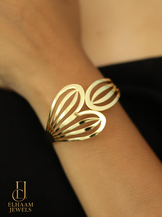 Golden Heart Cut-Out Bracelet by Elhaam Jewels