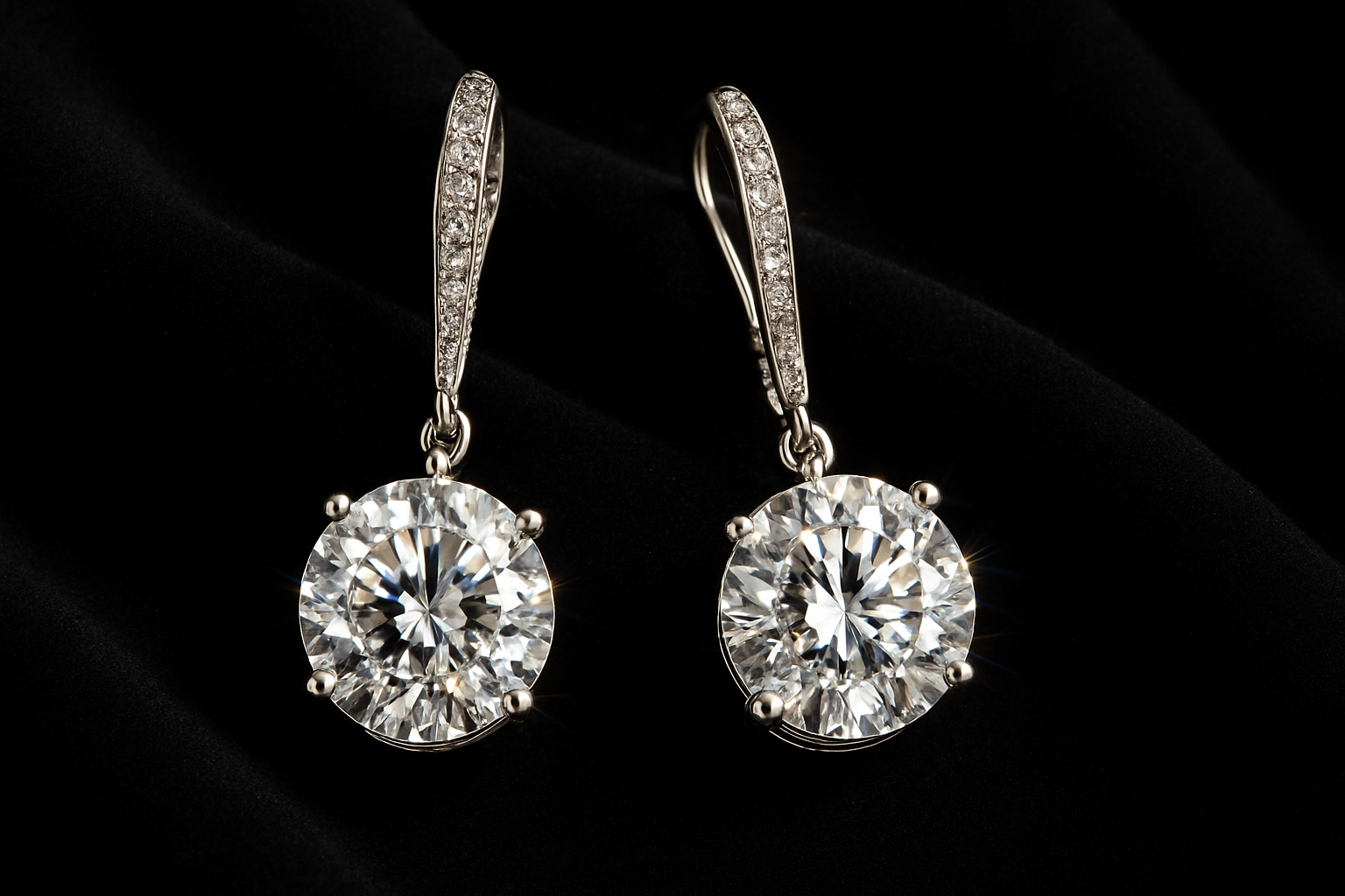 Beautiful diamond earrings set in black background